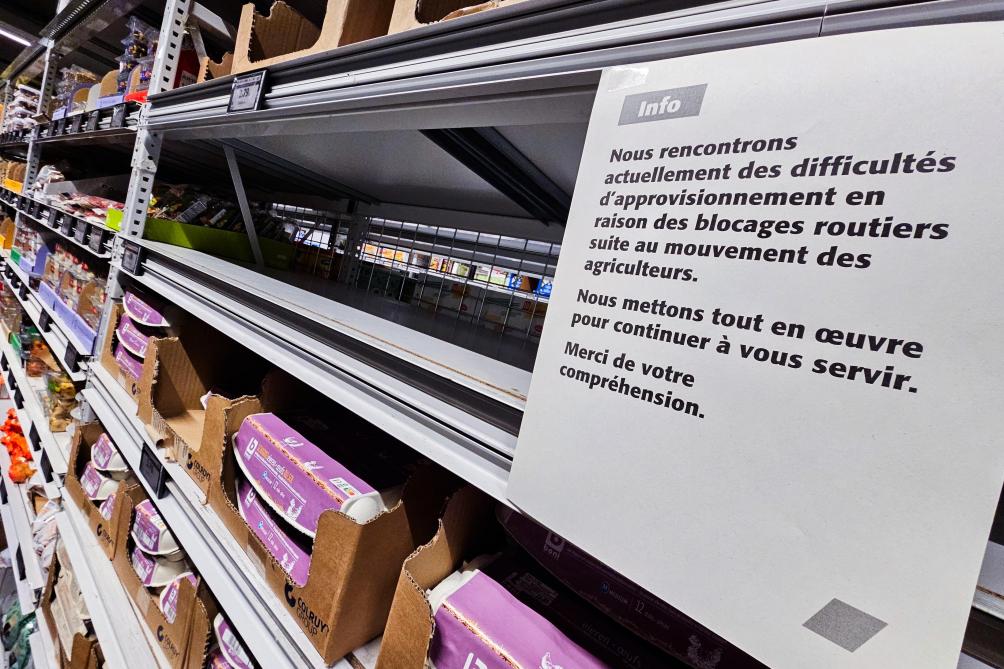 De blokkades zorgden voor lege winkelrekken in supermarkten. Hier op vrijdag 2 februari in een Colruyt in Ottignies-Louvain-la-Neuve.