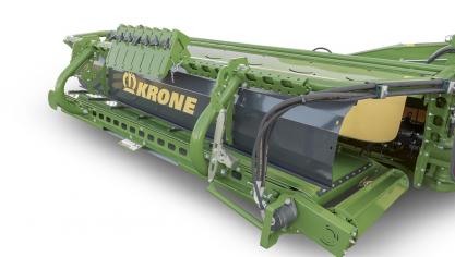 Van de nieuwe dwarsafvoerband met 910 mm breedte heeft Krone de diameter van de bandrollen 25% vergroot.
