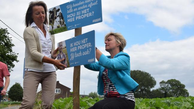 Landbouwminister van Vlaanderen Joke Schauvliege (rechts) en Boerenbond-voorzitter Sonja De Becker klimmen samen in het geweer tegen zwerfafval.